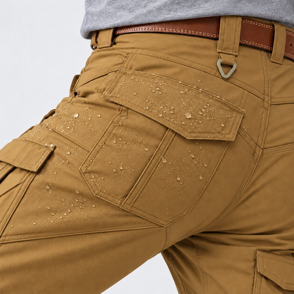 Water beading on the surface of cargo work pants